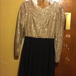 Shimmery gold and black long sleeved dress